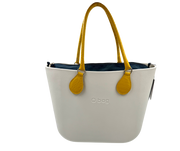 Obag mini bag in snow-white with mustard yellow handles and dark blue insert, perfect for women's fashion and premium brands.