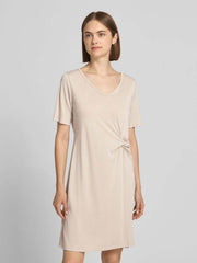 Pieces Pcanora Short Dress in soft beige, women's fashion, elegant V-neckline, twist-knot waist detail, premium designer clothing.