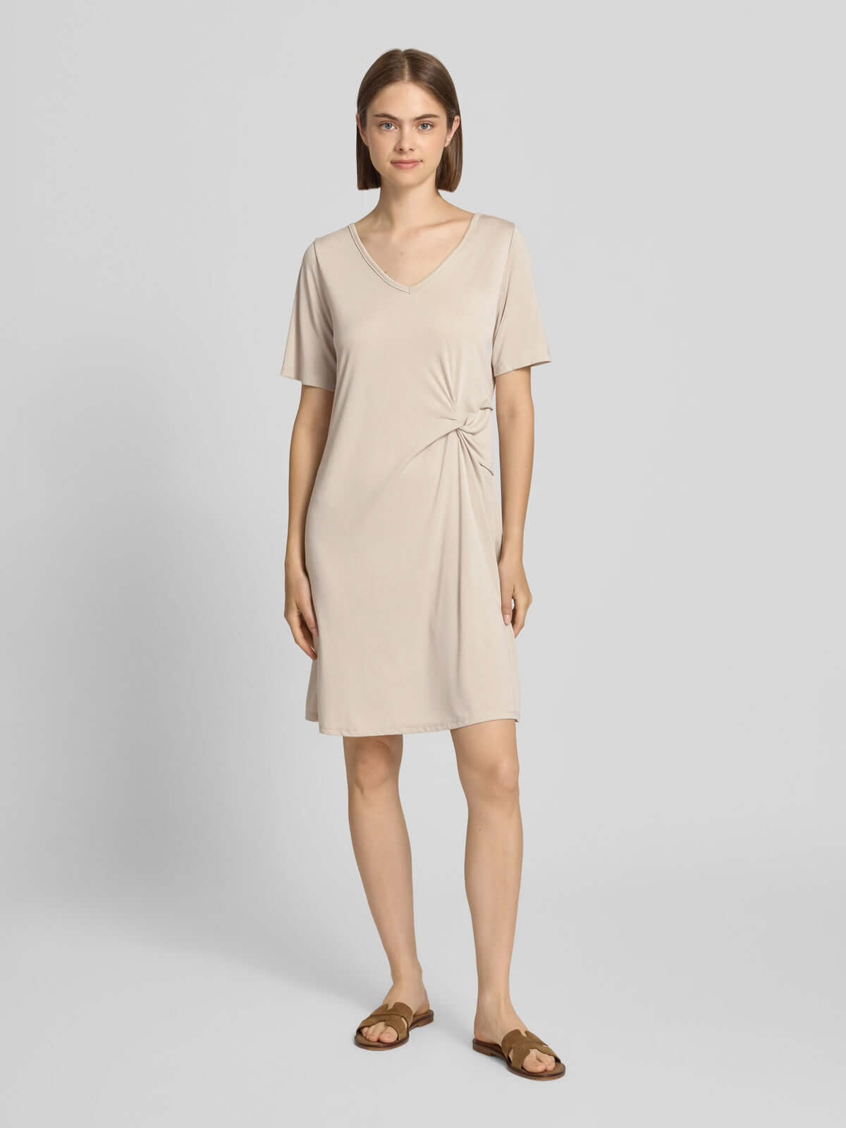 Pieces Pcanora Short Dress in beige, feminine women's fashion with V-neck and knot detail, premium designer clothing.