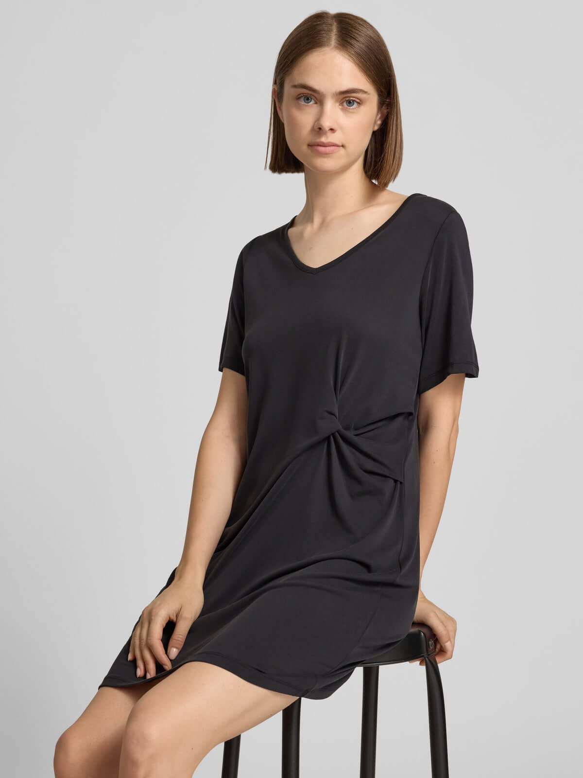 Pieces Pcanora Short Dress in black, women's fashion, designer clothing with short sleeves and twist-knot detail.