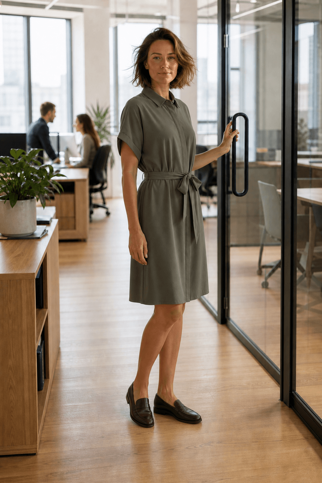 Woman wearing Vero Moda VMEASY JOY Shirt Dress – Khaki in an office setting, showcasing women's fashion and designer clothing.